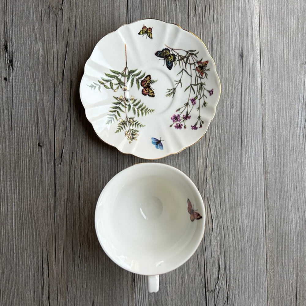 
                  
                    Butterflies and floral tea cup and saucer
                  
                