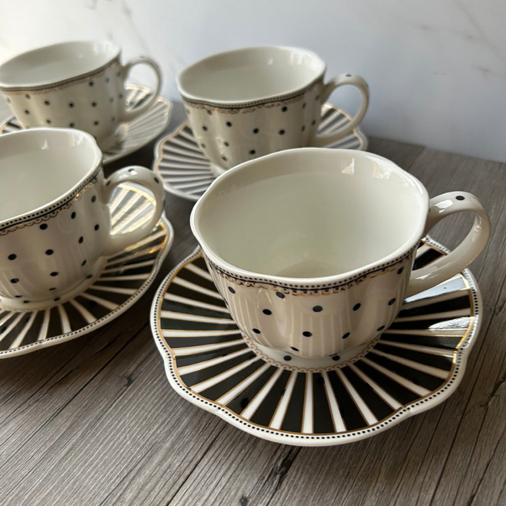 Black and white polka dot teacups and saucers